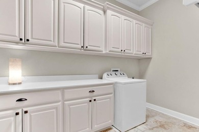 Discover an exceptional residence where sophisticated living on Hide-A-Way Lake Golf Course in Texas - for sale on GolfHomes.com, golf home, golf lot