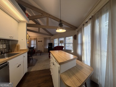 Nestled deep in Sky Valley's peaceful golf enclave, this on Sky Valley Resort and Country Club in Georgia - for sale on GolfHomes.com, golf home, golf lot