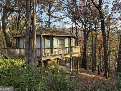 Nestled deep in Sky Valley's peaceful golf enclave, this on Sky Valley Resort and Country Club in Georgia - for sale on GolfHomes.com, golf home, golf lot