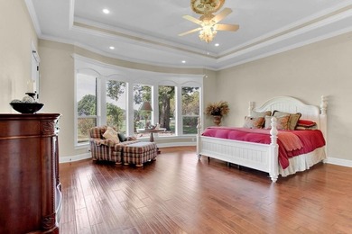 Discover an exceptional residence where sophisticated living on Hide-A-Way Lake Golf Course in Texas - for sale on GolfHomes.com, golf home, golf lot