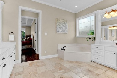 Discover an exceptional residence where sophisticated living on Hide-A-Way Lake Golf Course in Texas - for sale on GolfHomes.com, golf home, golf lot