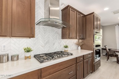 The moment you pull into the exquisite Encanterra comm. you'll on Encanterra Country Club in Arizona - for sale on GolfHomes.com, golf home, golf lot