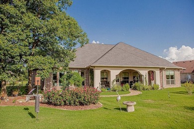 Discover an exceptional residence where sophisticated living on Hide-A-Way Lake Golf Course in Texas - for sale on GolfHomes.com, golf home, golf lot