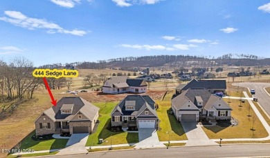 Welcome to this stunning SHOWCASE home perfectly situated within on Tennessee National Golf Club in Tennessee - for sale on GolfHomes.com, golf home, golf lot