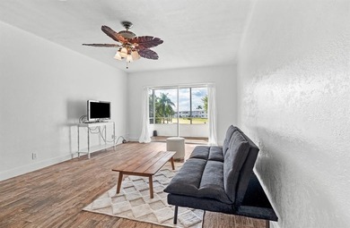 Move-in ready 1/1 condo on golf course in 55+ community. Kitchen on Leisureville Community Association in Florida - for sale on GolfHomes.com, golf home, golf lot