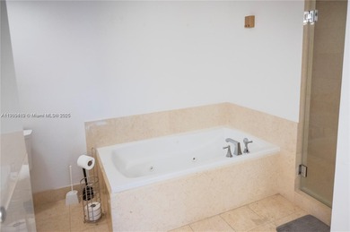 This elegant 2 bedroom, 2 bath residence offers 1,257 sq. ft, of on Turnberry Isle Resort and Club in Florida - for sale on GolfHomes.com, golf home, golf lot