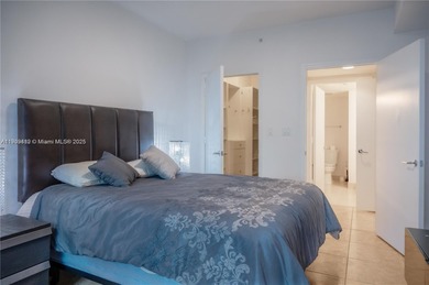 This elegant 2 bedroom, 2 bath residence offers 1,257 sq. ft, of on Turnberry Isle Resort and Club in Florida - for sale on GolfHomes.com, golf home, golf lot