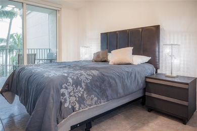 This elegant 2 bedroom, 2 bath residence offers 1,257 sq. ft, of on Turnberry Isle Resort and Club in Florida - for sale on GolfHomes.com, golf home, golf lot