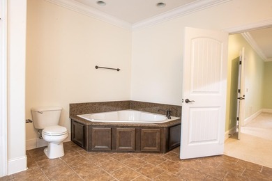 Welcome home to this beautiful well maintained home in Hampton on The Champions Club At Hampton Creek in Tennessee - for sale on GolfHomes.com, golf home, golf lot