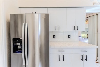 Welcome to this stunning, Magnolia model, end-unit villa on Timber Pines Golf Course in Florida - for sale on GolfHomes.com, golf home, golf lot