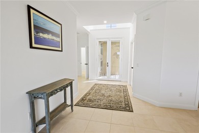 Welcome home to this beautiful golf course retreat. Perfectly on Grand Harbor Golf and Country Club in Florida - for sale on GolfHomes.com, golf home, golf lot