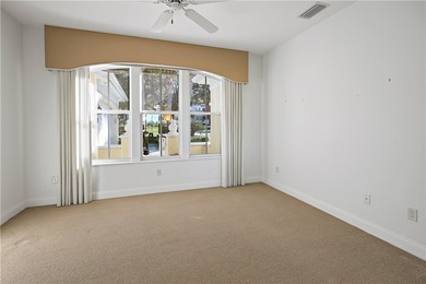 Welcome home to this beautiful golf course retreat. Perfectly on Grand Harbor Golf and Country Club in Florida - for sale on GolfHomes.com, golf home, golf lot