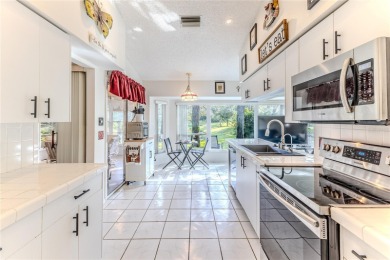 Welcome to this stunning, Magnolia model, end-unit villa on Timber Pines Golf Course in Florida - for sale on GolfHomes.com, golf home, golf lot