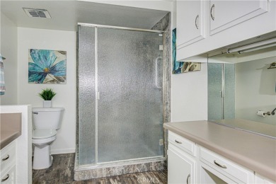 Step into this Beautiful *Seville Townhome*, one of our most on Leisure Village Par 3 Golf Course in California - for sale on GolfHomes.com, golf home, golf lot
