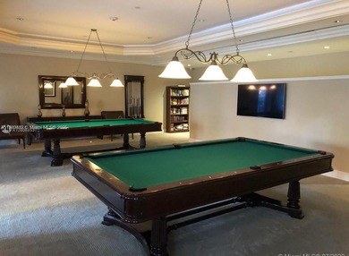 This elegant 2 bedroom, 2 bath residence offers 1,257 sq. ft, of on Turnberry Isle Resort and Club in Florida - for sale on GolfHomes.com, golf home, golf lot