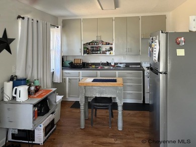 Charming and versatile! This updated and well-maintained duplex on Cottonwood Country Club in Wyoming - for sale on GolfHomes.com, golf home, golf lot