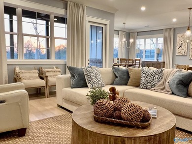 Step into this professionally decorated 3-bedroom, 2-bath home on Gunters Landing in Alabama - for sale on GolfHomes.com, golf home, golf lot