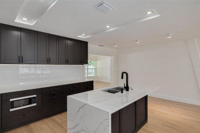 ABSOLUTELY GORGEOUS METICULOUSLY RENOVATED 4 BEDROOM/ 2 BATH/ on Belleview Biltmore Golf Club in Florida - for sale on GolfHomes.com, golf home, golf lot