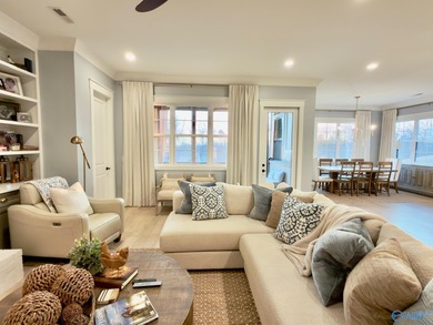 Step into this professionally decorated 3-bedroom, 2-bath home on Gunters Landing in Alabama - for sale on GolfHomes.com, golf home, golf lot