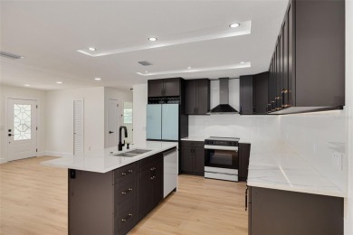 ABSOLUTELY GORGEOUS METICULOUSLY RENOVATED 4 BEDROOM/ 2 BATH/ on Belleview Biltmore Golf Club in Florida - for sale on GolfHomes.com, golf home, golf lot