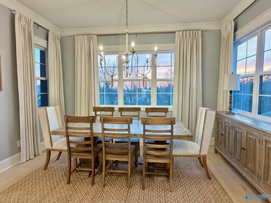 Step into this professionally decorated 3-bedroom, 2-bath home on Gunters Landing in Alabama - for sale on GolfHomes.com, golf home, golf lot