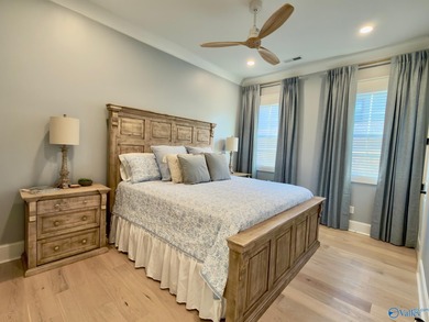 Step into this professionally decorated 3-bedroom, 2-bath home on Gunters Landing in Alabama - for sale on GolfHomes.com, golf home, golf lot