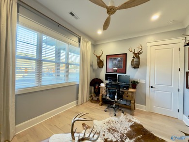 Step into this professionally decorated 3-bedroom, 2-bath home on Gunters Landing in Alabama - for sale on GolfHomes.com, golf home, golf lot