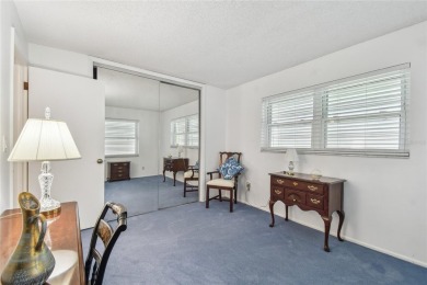 Pride of ownership is evident in this 2-bedroom, 3 full-bath on The Dunedin Country Club in Florida - for sale on GolfHomes.com, golf home, golf lot