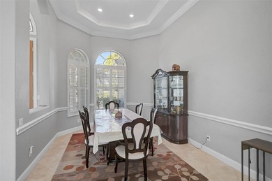 **ELEGANT UPDATED RESIDENCE IN THE OAKS | MODERN COMFORT ON A on The Oaks Club in Florida - for sale on GolfHomes.com, golf home, golf lot