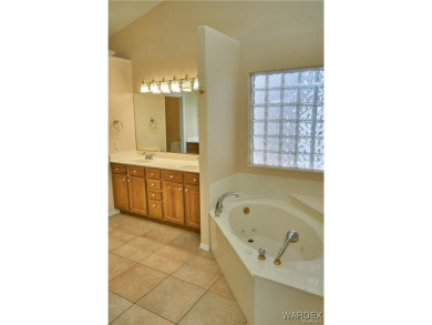 POOL HOME. Spacious 3 bedroom 2.5 bath property located in the on Los Lagos Golf Club in Arizona - for sale on GolfHomes.com, golf home, golf lot