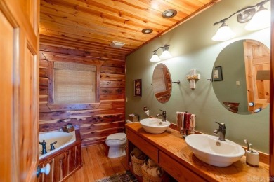 LAKEFRONT! Custom built in 2005, this beautiful log home is your on  in Arkansas - for sale on GolfHomes.com, golf home, golf lot