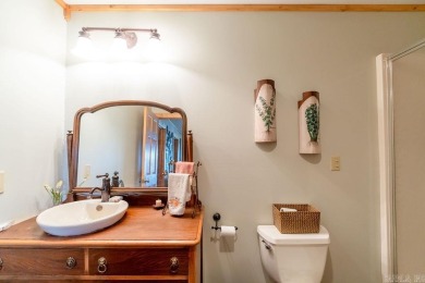 LAKEFRONT! Custom built in 2005, this beautiful log home is your on  in Arkansas - for sale on GolfHomes.com, golf home, golf lot