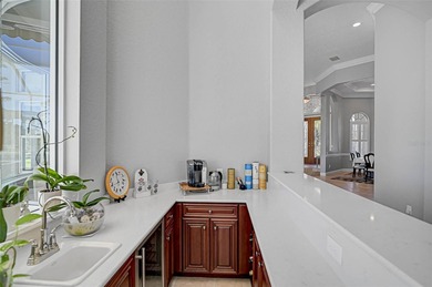 **ELEGANT UPDATED RESIDENCE IN THE OAKS | MODERN COMFORT ON A on The Oaks Club in Florida - for sale on GolfHomes.com, golf home, golf lot