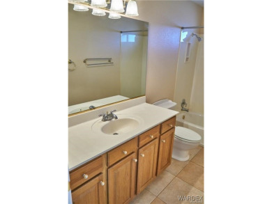 POOL HOME. Spacious 3 bedroom 2.5 bath property located in the on Los Lagos Golf Club in Arizona - for sale on GolfHomes.com, golf home, golf lot