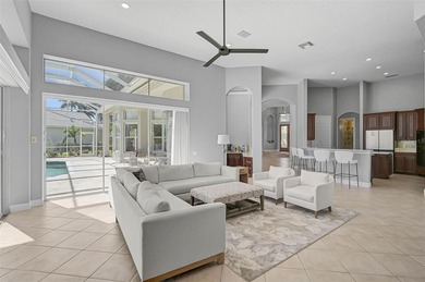 **ELEGANT UPDATED RESIDENCE IN THE OAKS | MODERN COMFORT ON A on The Oaks Club in Florida - for sale on GolfHomes.com, golf home, golf lot
