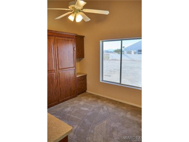 POOL HOME. Spacious 3 bedroom 2.5 bath property located in the on Los Lagos Golf Club in Arizona - for sale on GolfHomes.com, golf home, golf lot