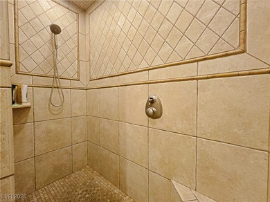 This bright and inviting condo sits on the first floor and on Reflection Bay Golf Club in Nevada - for sale on GolfHomes.com, golf home, golf lot