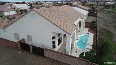 POOL HOME. Spacious 3 bedroom 2.5 bath property located in the on Los Lagos Golf Club in Arizona - for sale on GolfHomes.com, golf home, golf lot