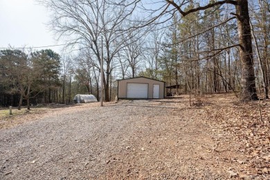 LAKEFRONT! Custom built in 2005, this beautiful log home is your on  in Arkansas - for sale on GolfHomes.com, golf home, golf lot