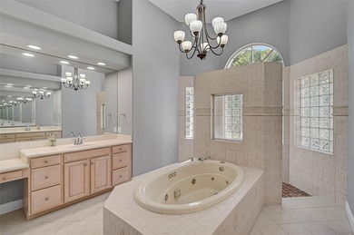 **ELEGANT UPDATED RESIDENCE IN THE OAKS | MODERN COMFORT ON A on The Oaks Club in Florida - for sale on GolfHomes.com, golf home, golf lot