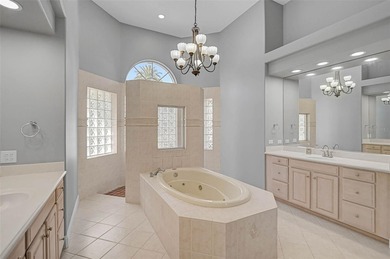 **ELEGANT UPDATED RESIDENCE IN THE OAKS | MODERN COMFORT ON A on The Oaks Club in Florida - for sale on GolfHomes.com, golf home, golf lot