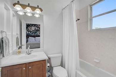 **ELEGANT UPDATED RESIDENCE IN THE OAKS | MODERN COMFORT ON A on The Oaks Club in Florida - for sale on GolfHomes.com, golf home, golf lot