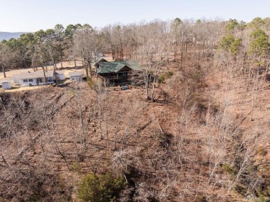 LAKEFRONT! Custom built in 2005, this beautiful log home is your on  in Arkansas - for sale on GolfHomes.com, golf home, golf lot