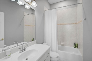 **ELEGANT UPDATED RESIDENCE IN THE OAKS | MODERN COMFORT ON A on The Oaks Club in Florida - for sale on GolfHomes.com, golf home, golf lot