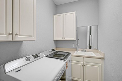 **ELEGANT UPDATED RESIDENCE IN THE OAKS | MODERN COMFORT ON A on The Oaks Club in Florida - for sale on GolfHomes.com, golf home, golf lot