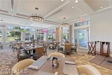 Nestled within the prestigious Colonial Country Club, this on Pelican Preserve Golf Club in Florida - for sale on GolfHomes.com, golf home, golf lot