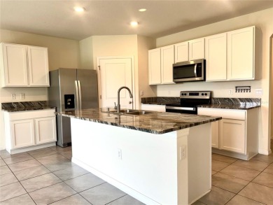Welcome to this beautiful concrete block house in Lake Diamond on Lake Diamond Golf and Country Club in Florida - for sale on GolfHomes.com, golf home, golf lot