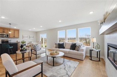 Come home to this attractive 4-bedroom, 3.5-bath two-story on Golf Club of Creekmoor in Missouri - for sale on GolfHomes.com, golf home, golf lot