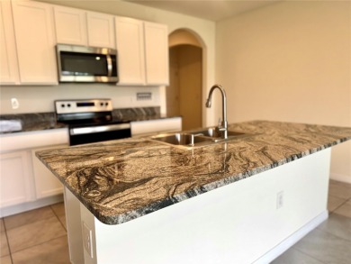 Welcome to this beautiful concrete block house in Lake Diamond on Lake Diamond Golf and Country Club in Florida - for sale on GolfHomes.com, golf home, golf lot