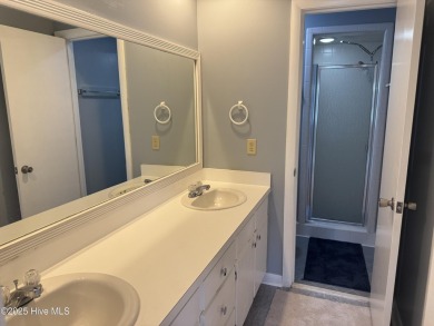 Welcome to easy living in this beautifully maintained 2-bedroom on Wilson Country Club in North Carolina - for sale on GolfHomes.com, golf home, golf lot